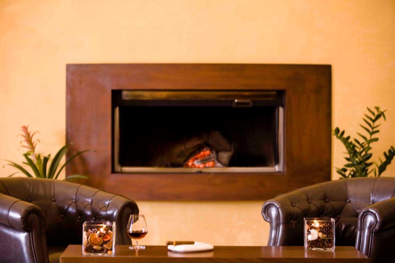 Valis Resort Hotel โวโลส ภายนอก รูปภาพ A fireplace